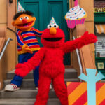 Elmo and Ernie celebrate Sesame Place San Diego 4th birthday with party decorations