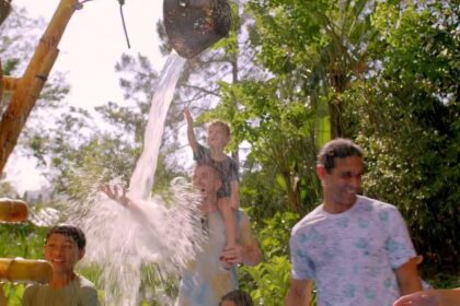 Families enjoy a water play area at Universal Kids Resort in Frisco, Texas