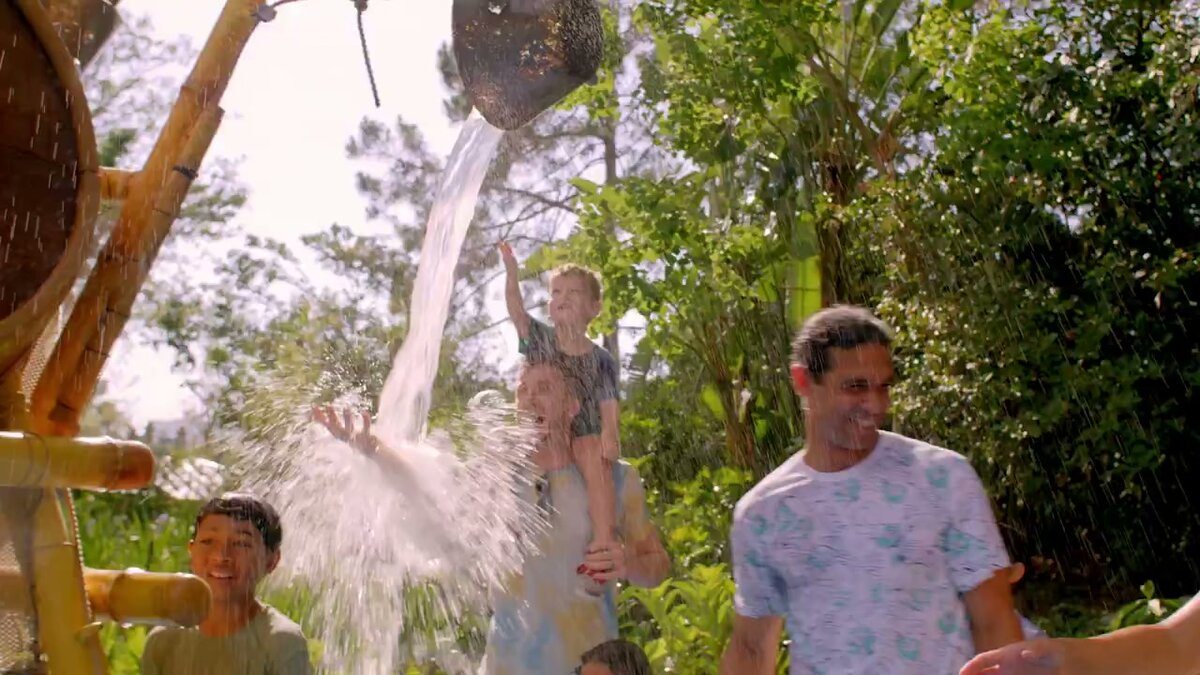 Families enjoy a water play area at Universal Kids Resort in Frisco, Texas