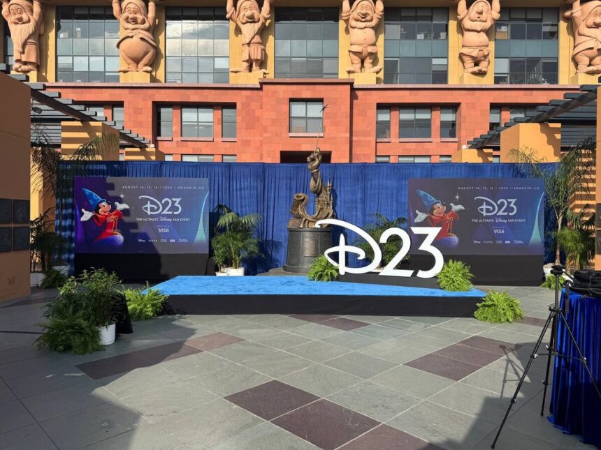 D23 2026 media event stage with Sorcerer Mickey banners and D23 logo