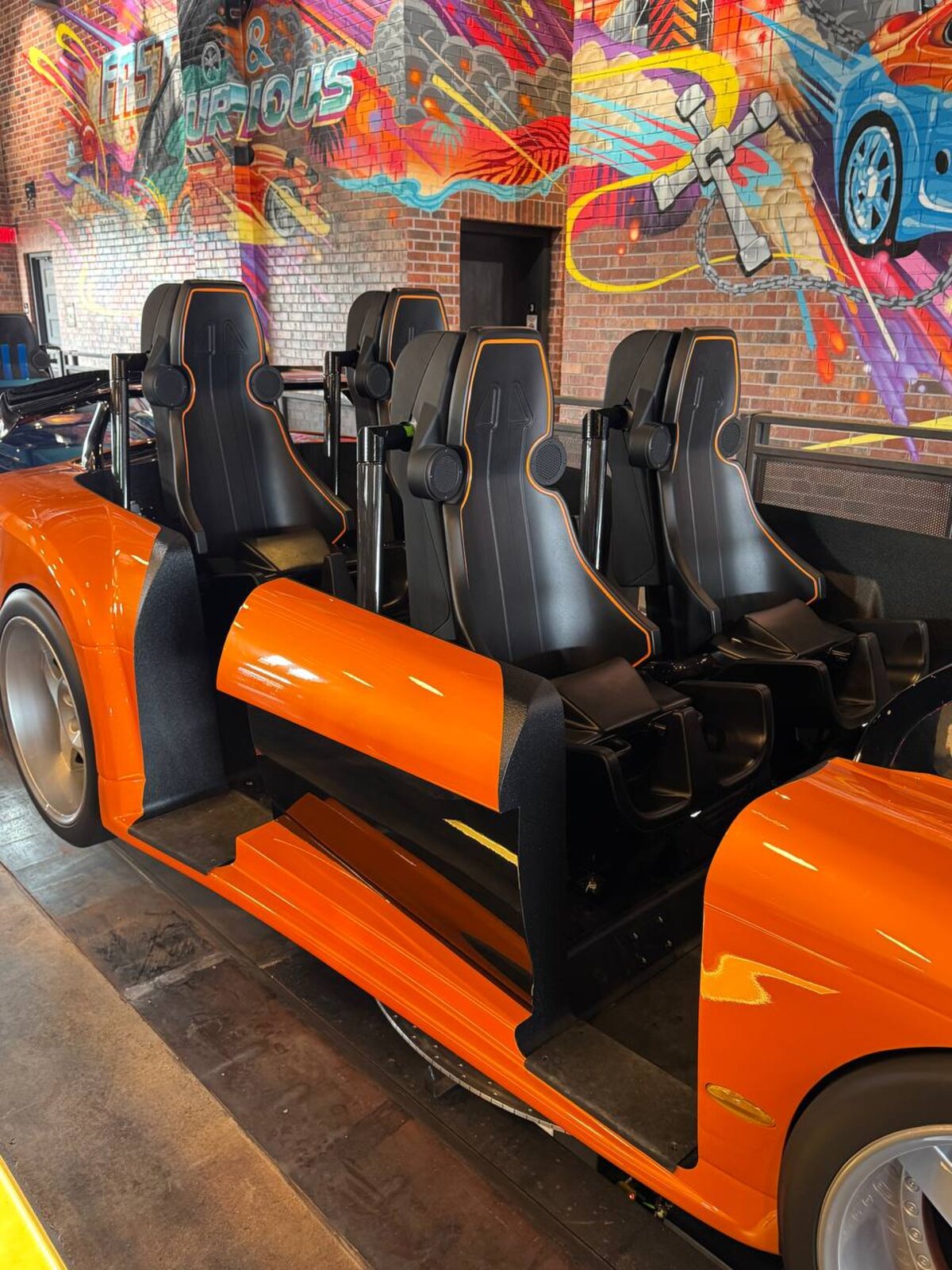 Seat detail inside Brian's Toyota Supra ride vehicle on Fast & Furious: Hollywood Drift