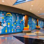 Reimagined lobby at Disneys Pop Century Resort with retro pop culture artwork
