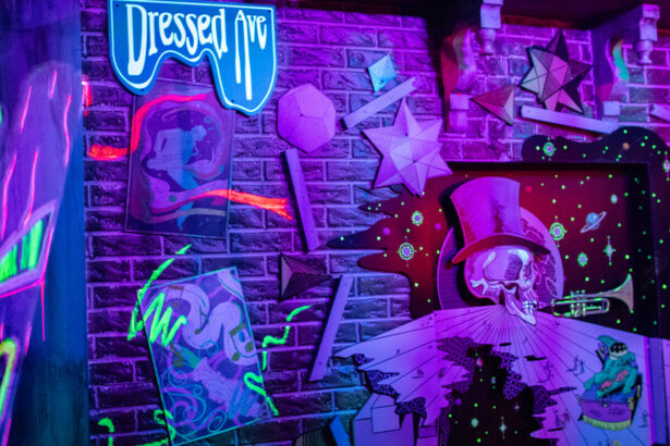 Neon Baron TonTon artwork at Universal Mardi Gras 2026 Tribute Store