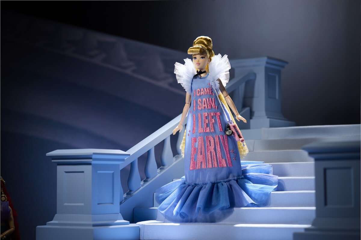 Viktor&Rolf x Disney Collector Cinderella Doll on iconic staircase in blue gown reading "I Came, I Saw, I Left Early"