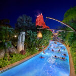 Kopiko Wai Winding River glowing blue at night during Volcano Bay Nights 2026