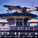 An X-wing above Starport at Disneyland Paris for Star Wars Day