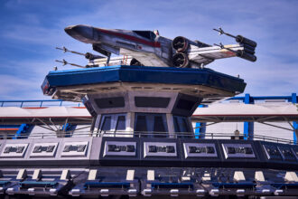 An X-wing above Starport at Disneyland Paris for Star Wars Day