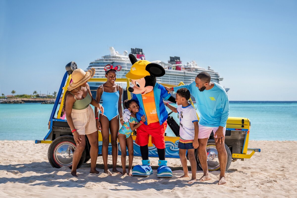 Family with Mickey Mouse near a Disney Cruise Line ship