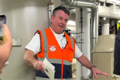 Disney Destiny chief engineer leads a below-deck tour in the ship's engine spaces. Photo courtesy of Disney Parks Blog.