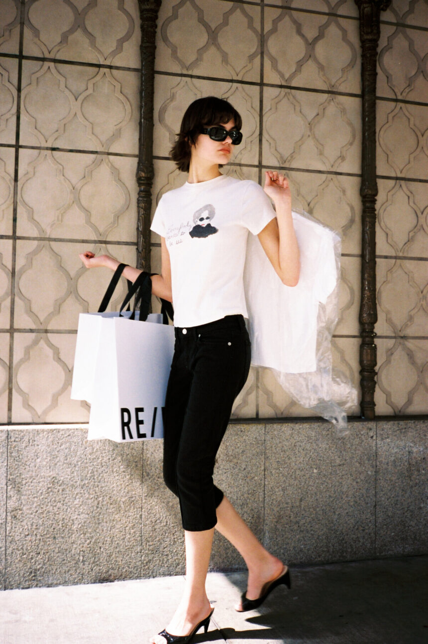 Model wearing a Disney and RE/DONE Devil Wears Prada inspired graphic tee from the new capsule collection