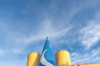 Mickey's Sorcerer Hat installed on The Magic of Disney Animation facade at Disney's Hollywood Studios