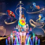 Pixar Summer Fest promotional art for Hong Kong Disneyland showing Pixar characters around the castle at night