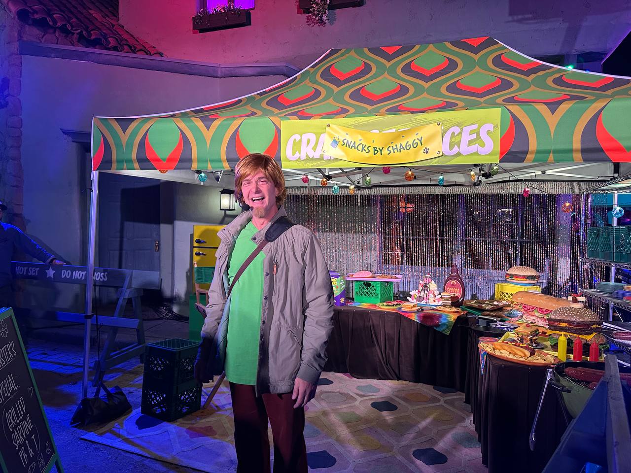 Shaggy standing near the Snacks by Shaggy setup at Universal Fan Fest Nights