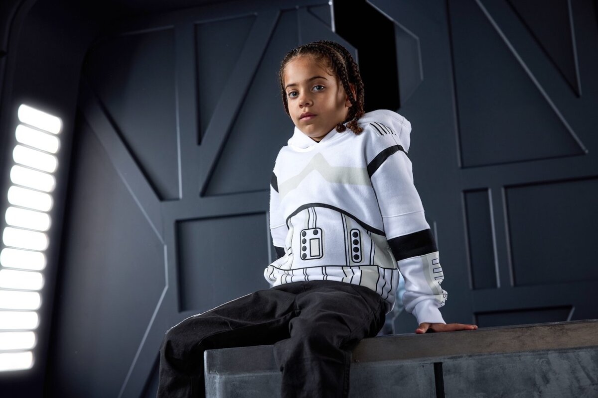 Child model wearing a Star Wars Stormtrooper hoodie from Disney’s 2026 May the 4th merch lineup