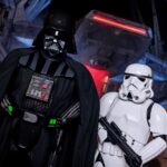 Darth Vader with Imperial stormtroopers in official Disneyland Galaxy's Edge artwork