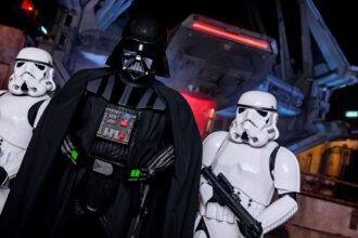 Darth Vader with Imperial stormtroopers in official Disneyland Galaxy's Edge artwork