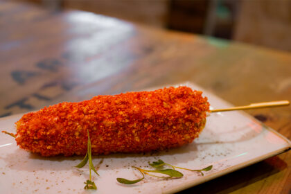 Street elote at Antojitos for the Cinco de Mayo menu at Universal CityWalk