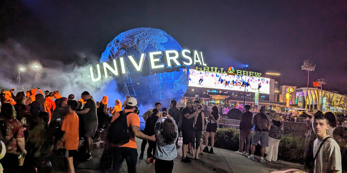 Guests near the Universal globe at Universal Orlando Resort