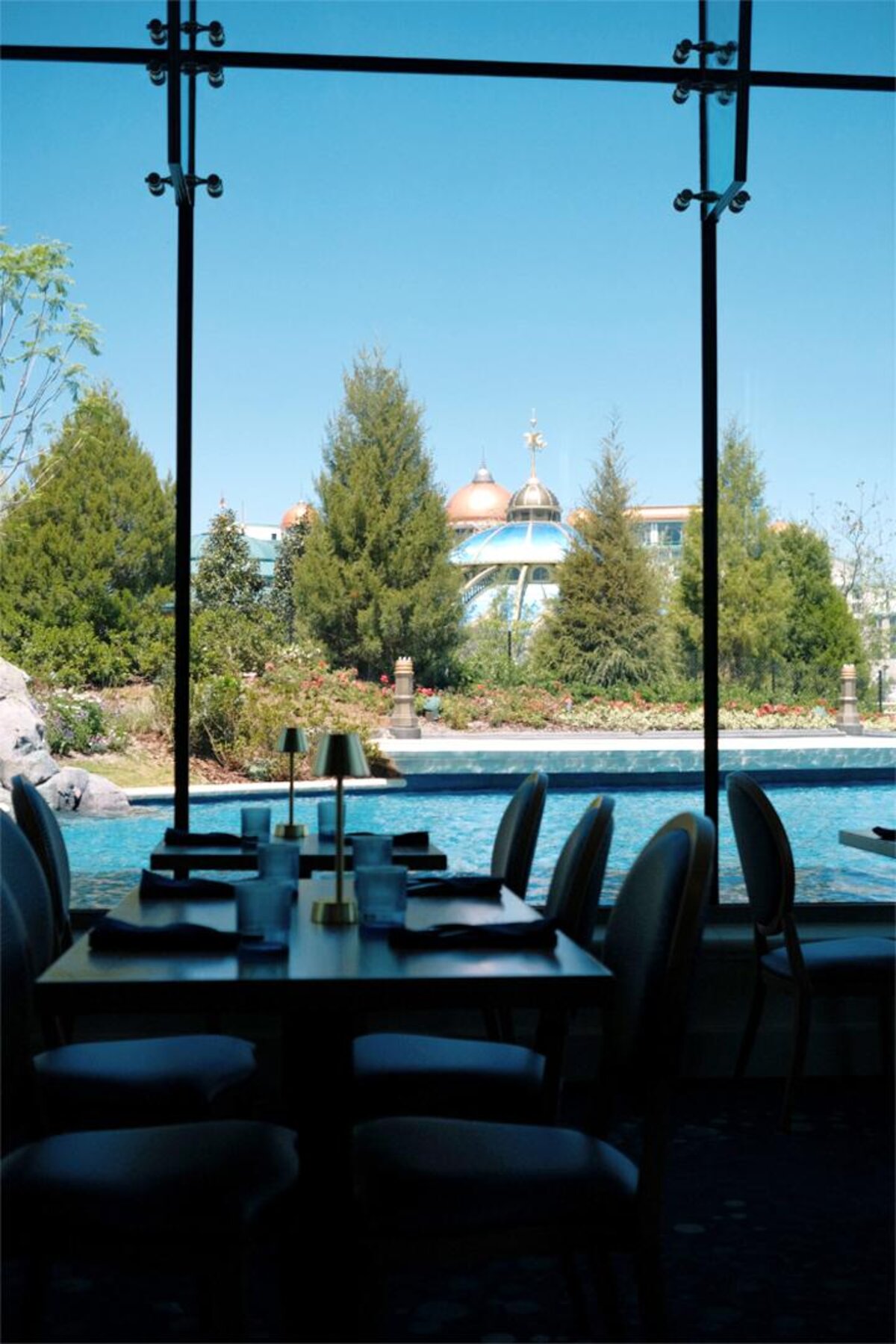 Views of Epic Universe from inside Atlantic restaurant at Celestial Park