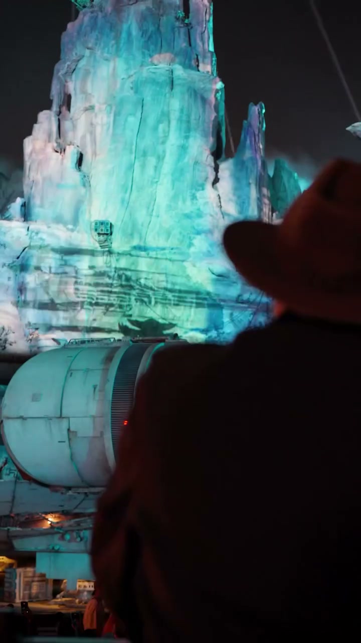 Grogu projection lighting at Star Wars: Galaxy’s Edge in Disneyland park for The Curious Child.