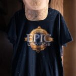 Universal Epic Universe T-shirt merchandise shown in Universal Orlando Resort's official merchandise guide
