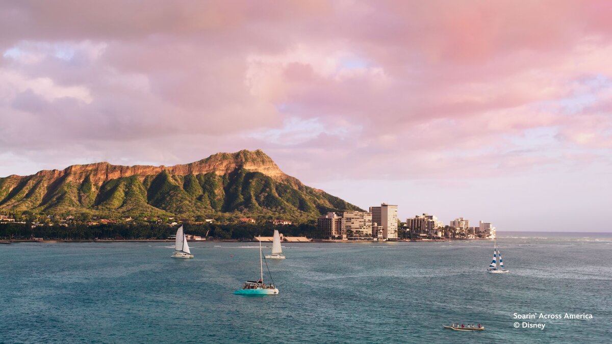 A Soarin Across America scene showing sunlit island shores in Hawaii