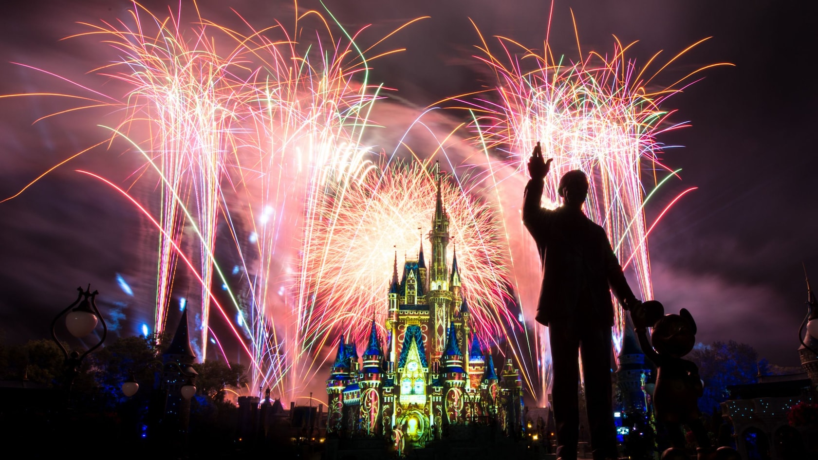 Fireworks burst over Cinderella Castle at Magic Kingdom during Walt Disney World nighttime entertainment
