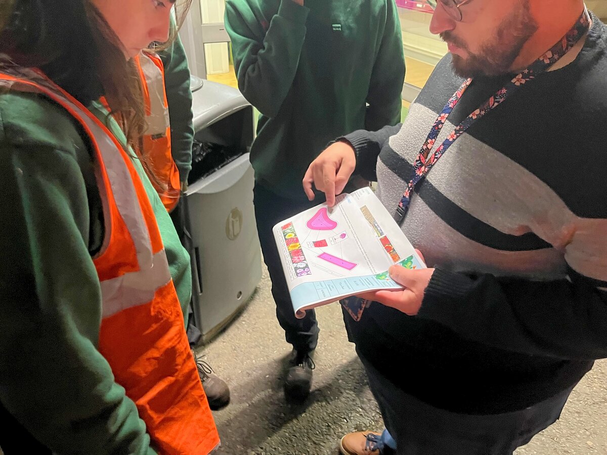 Disneyland Paris Horticulture team reviewing landscape plans during the night briefing
