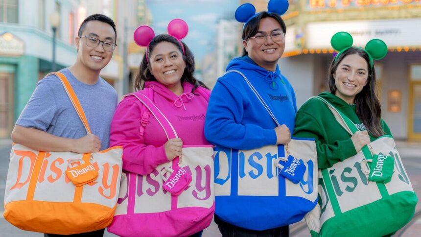 Disney Parks guests wearing Logo Mania merchandise in multiple colors