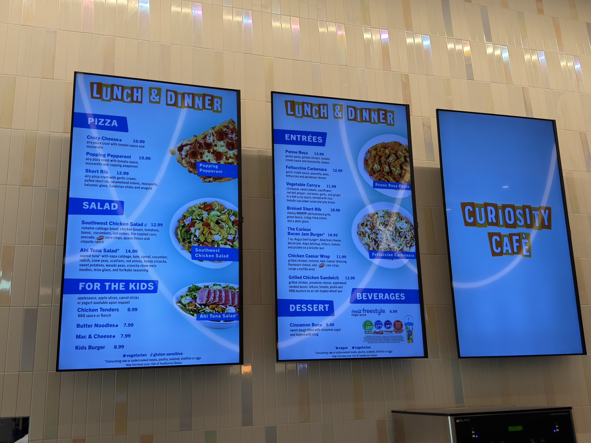 Curiosity Cafe menu in the lobby of the Universal Kids Resort Hotel