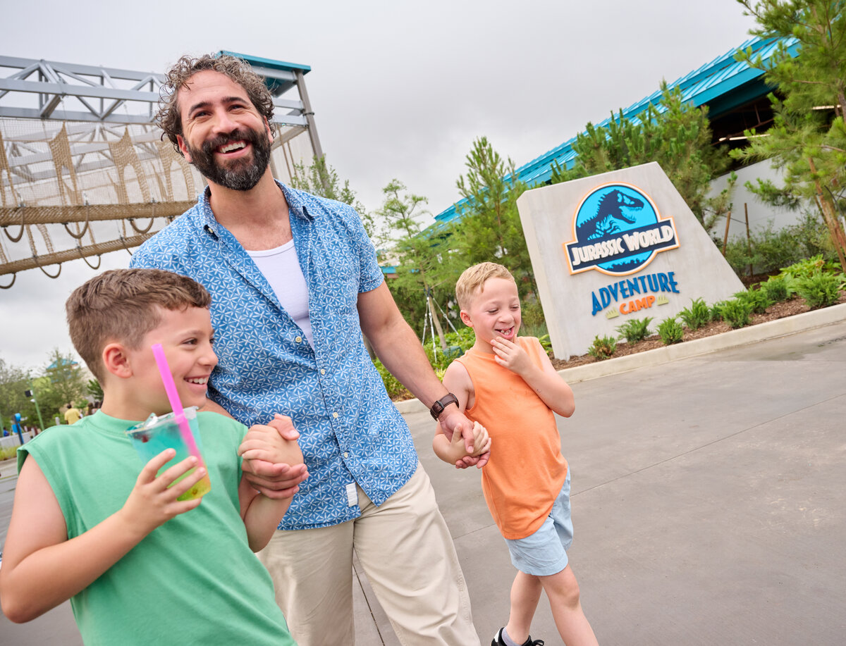Family at the Jurassic World Adventure Camp entrance