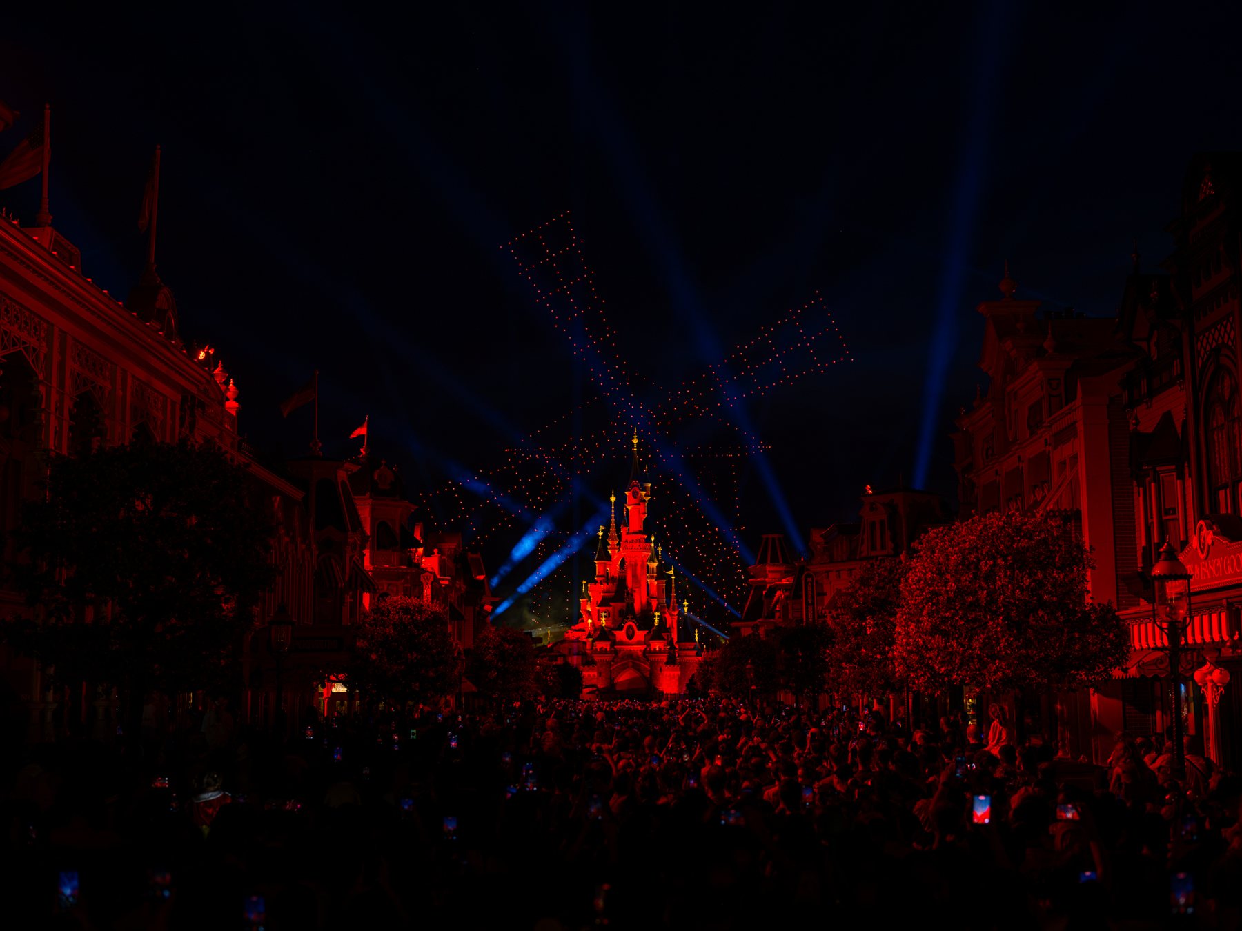 Disneyland Paris Bastille Day drone show above Sleeping Beauty Castle