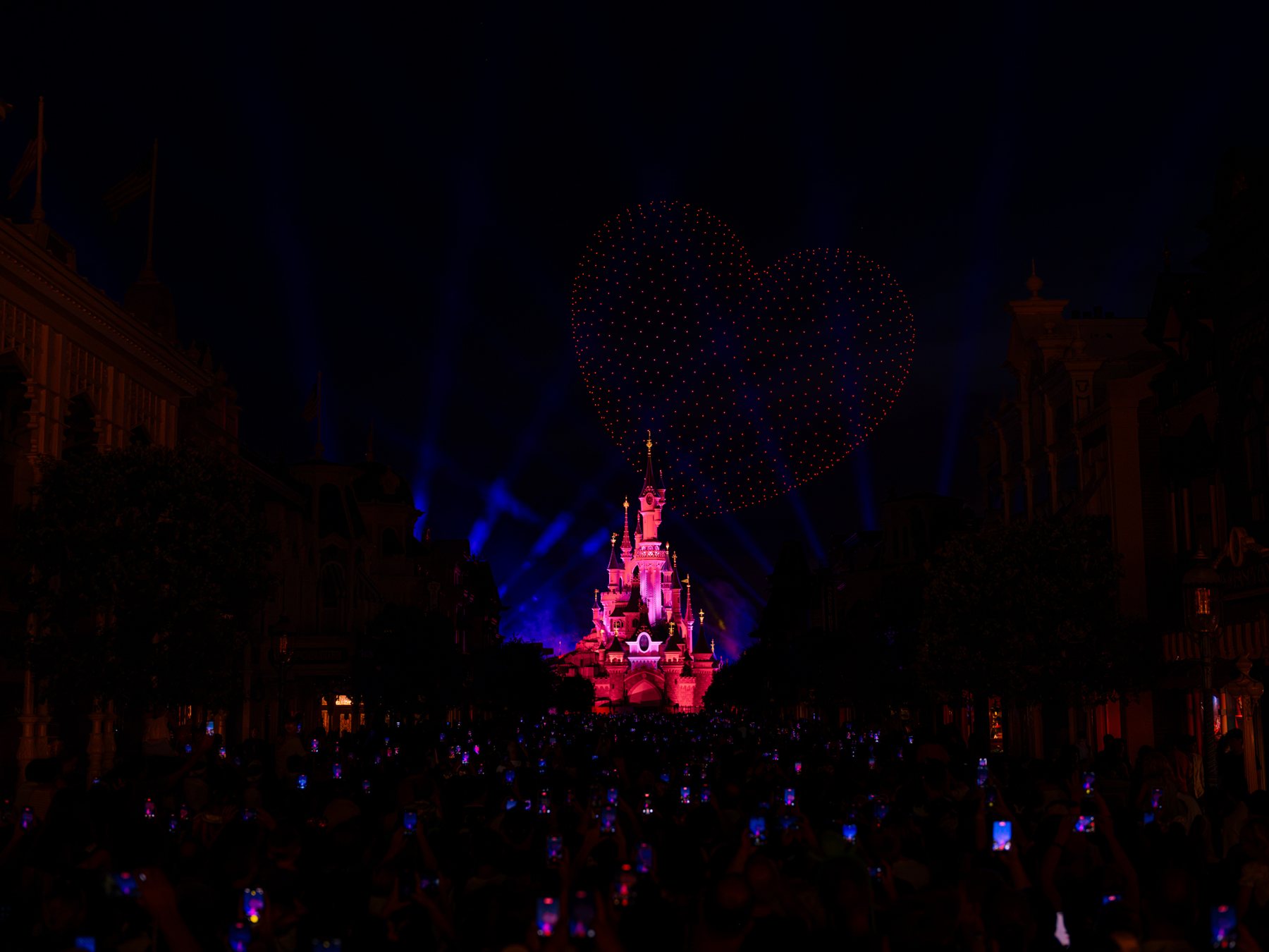 Disneyland Paris Bastille Day drone show above Sleeping Beauty Castle