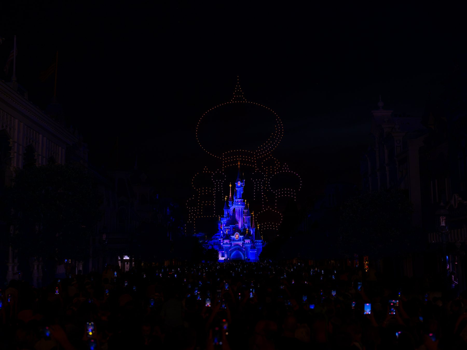 Disneyland Paris Bastille Day drone show above Sleeping Beauty Castle
