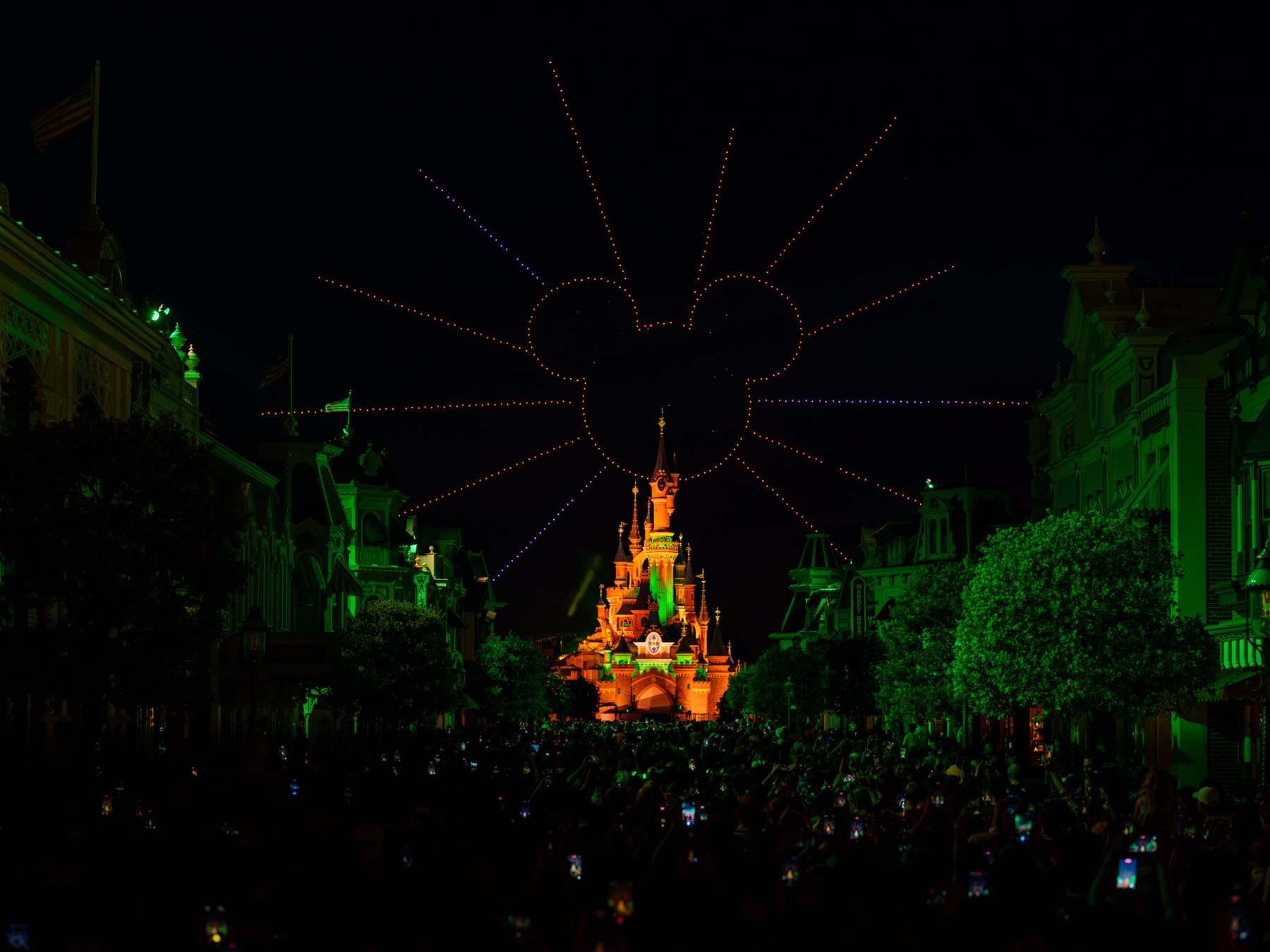 Disneyland Paris Bastille Day drone show above Sleeping Beauty Castle