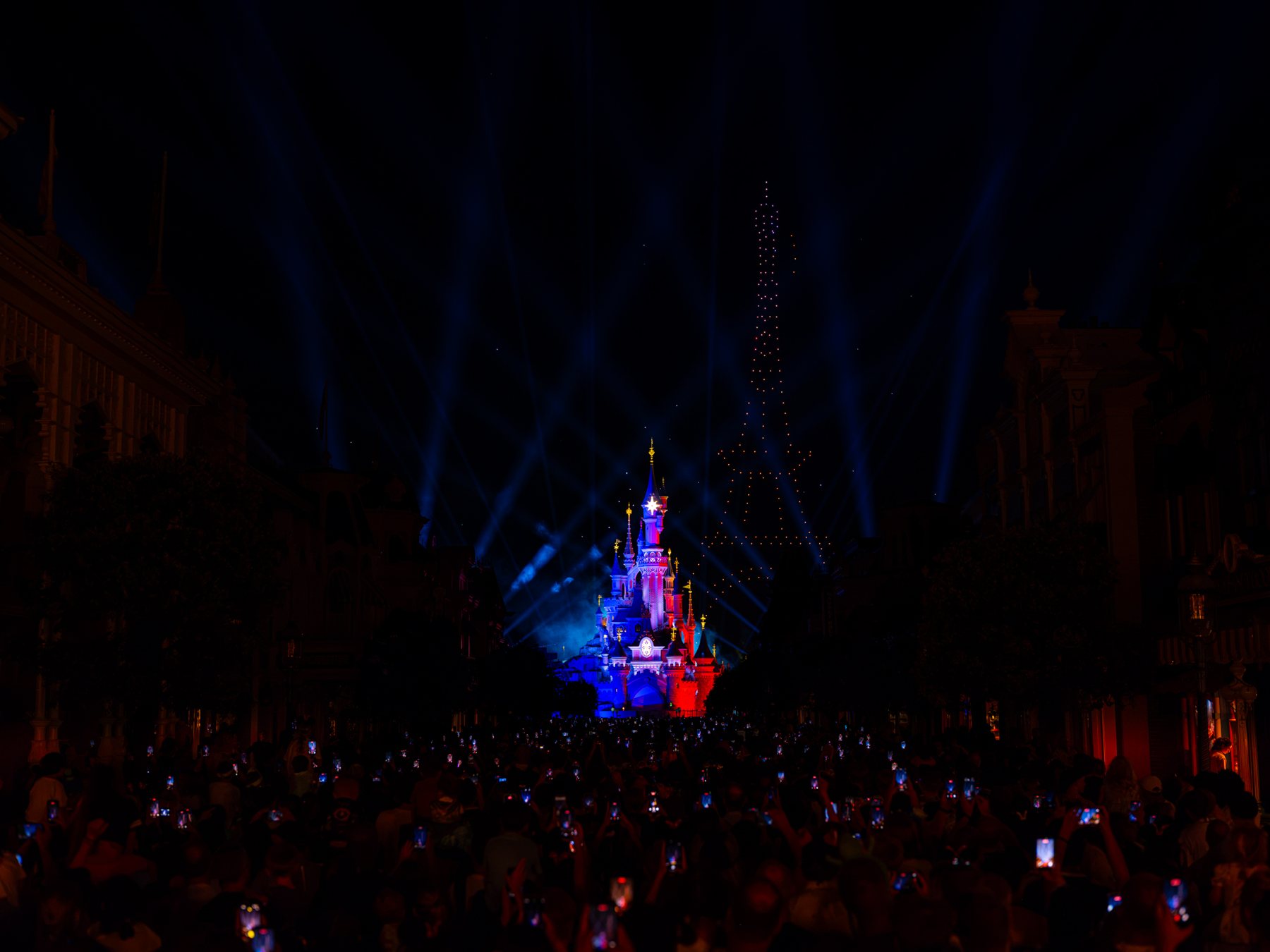 Disneyland Paris Bastille Day drone show above Sleeping Beauty Castle