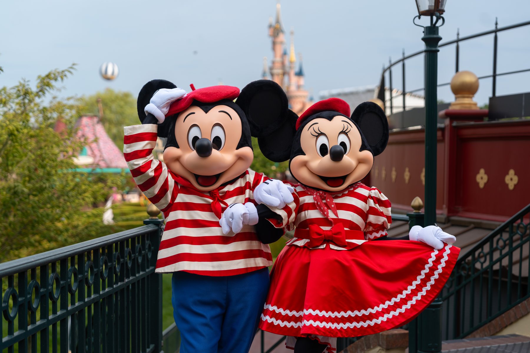 Mickey Mouse and Minnie Mouse in Bastille Day outfits at Disneyland Paris