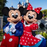 Mickey Mouse and Minnie Mouse in patriotic outfits for Disney America 250 celebrations