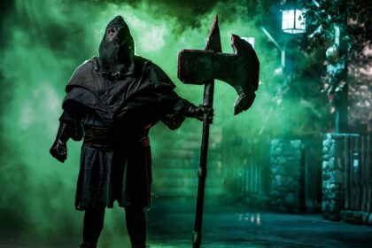 Knott's Scary Farm executioner monster in green fog