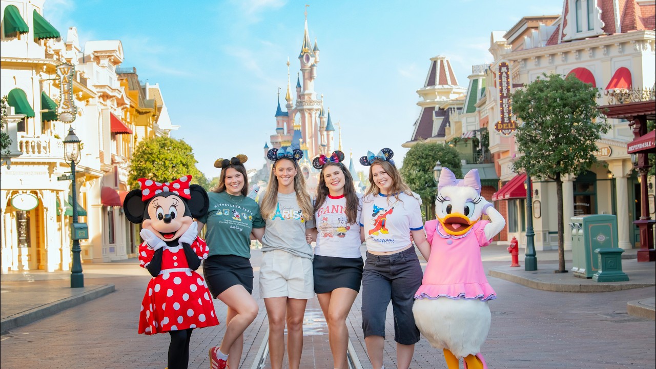 Kylie Kelce, Ilona Maher, and Ilona's sisters pose with Minnie Mouse and Daisy Duck on Main Street U.S.A. at Disneyland Paris