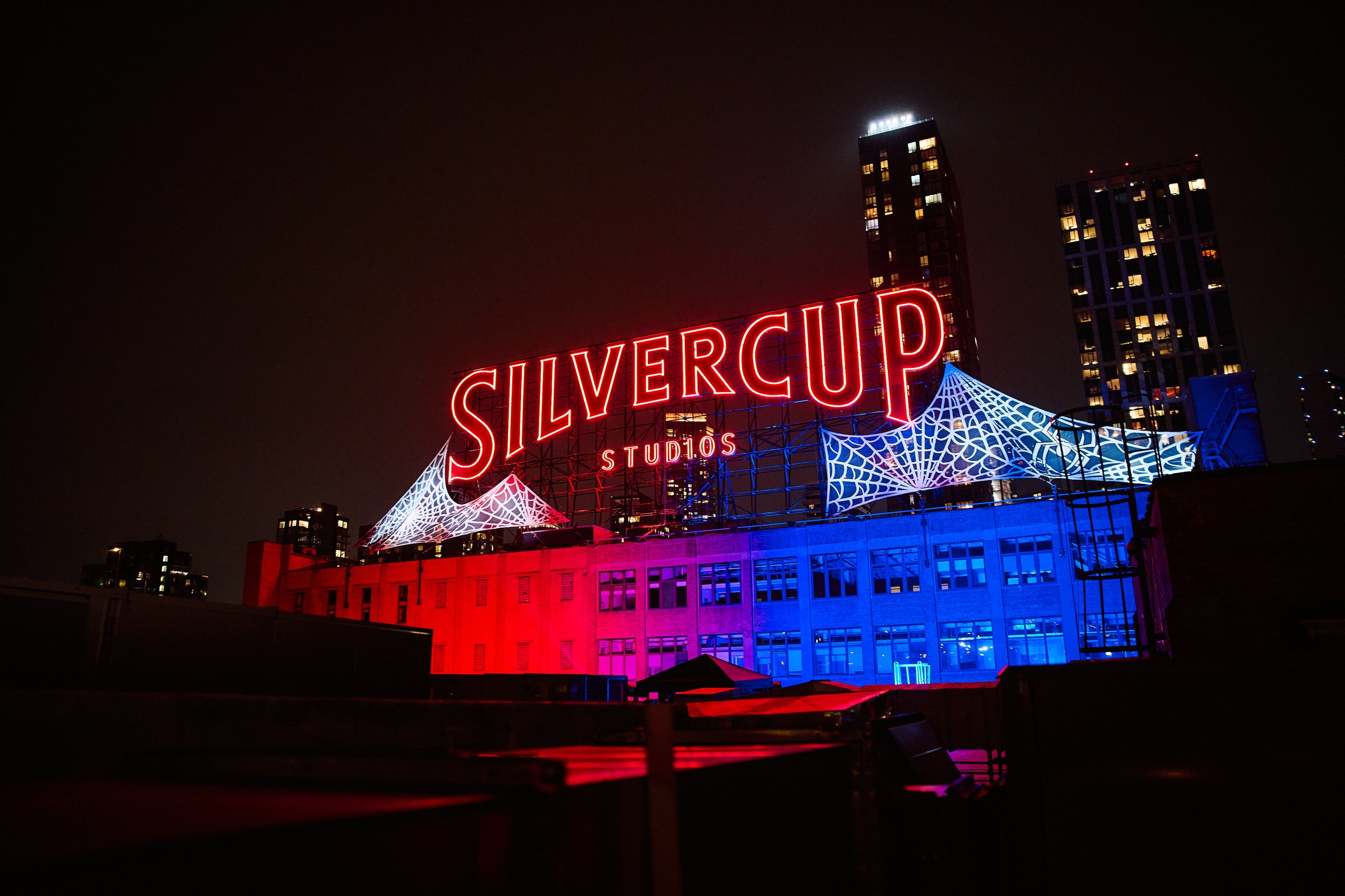 Silvercup Studios illuminated with Spider-Man web projections