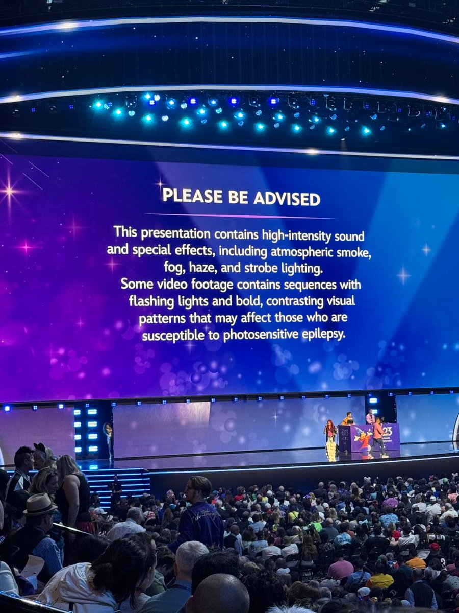 The warning screen is up inside Honda Center: high-intensity sound, smoke, and strobes ahead. The Disney Enter
