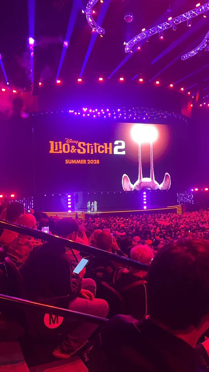 Lilo and Stitch 2 is official for Summer 2028. The title card just went up on the arena screen at D23.