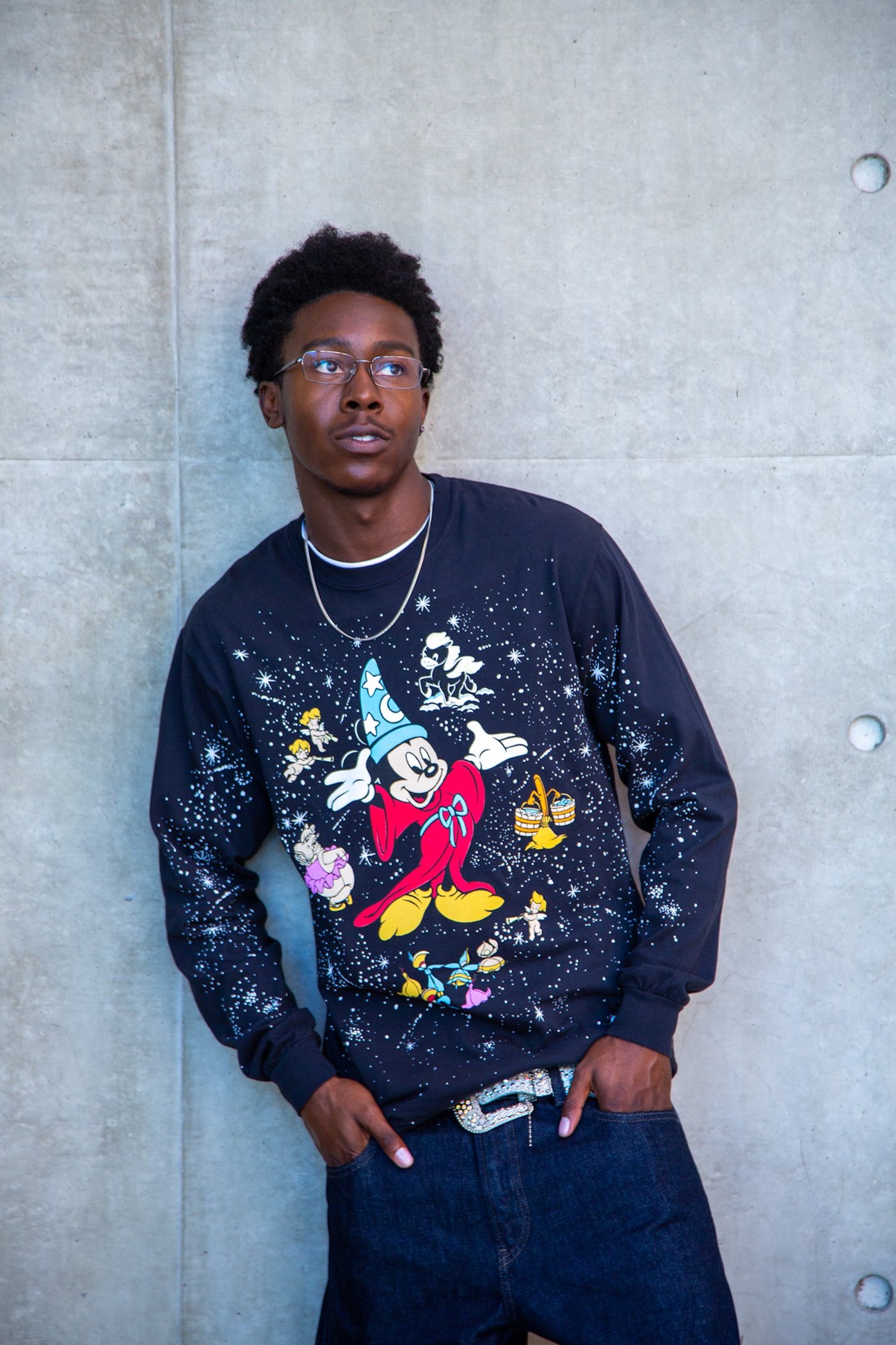 Model wearing the Disney Bobby Kim Sorcerer's Apprentice Mickey Mouse long sleeved tee