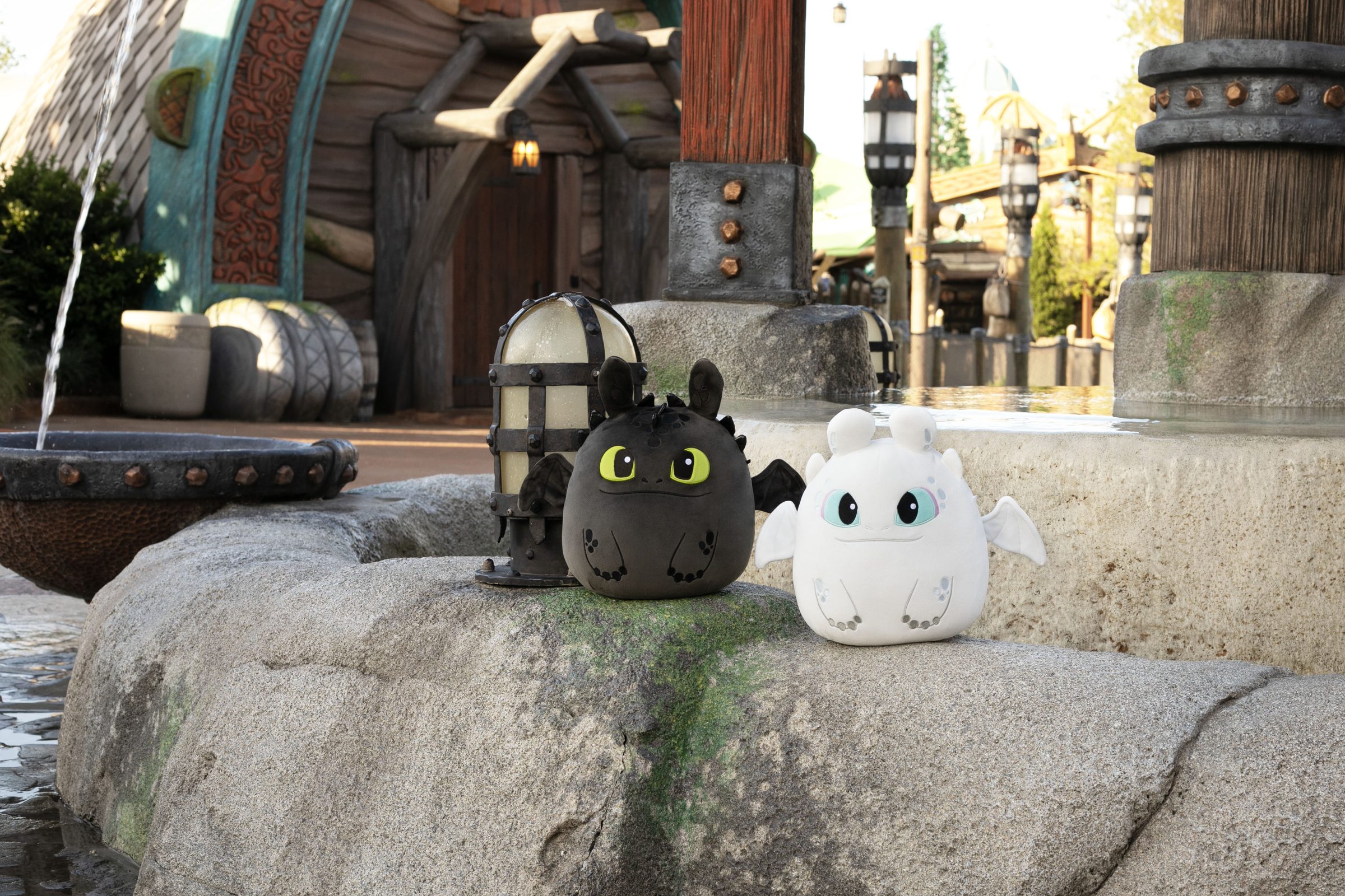 Toothless and Light Fury How to Train Your Dragon Squishmallows displayed together at Universal