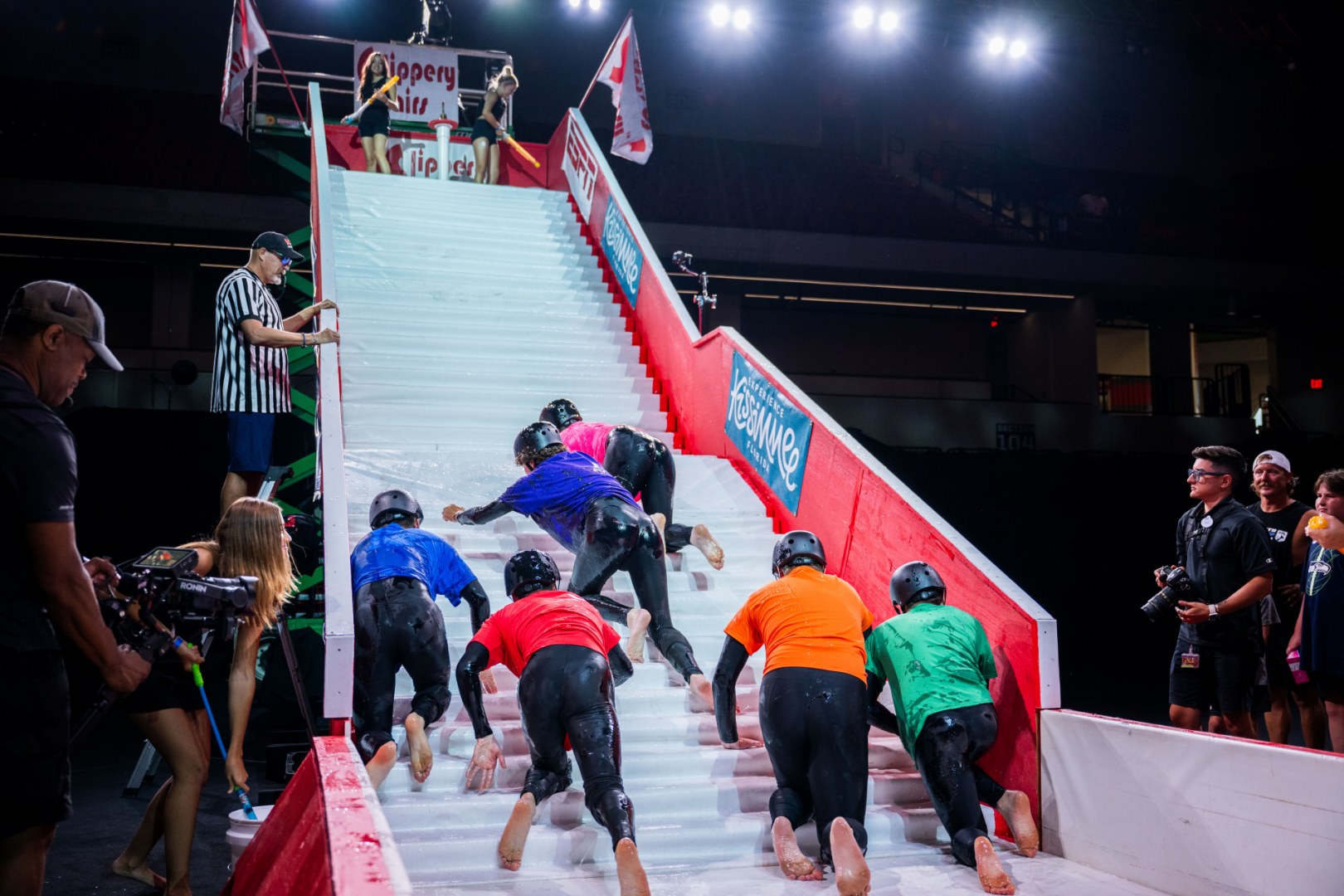 Competitors climbing the Slippery Stairs course at ESPN Wide World of Sports