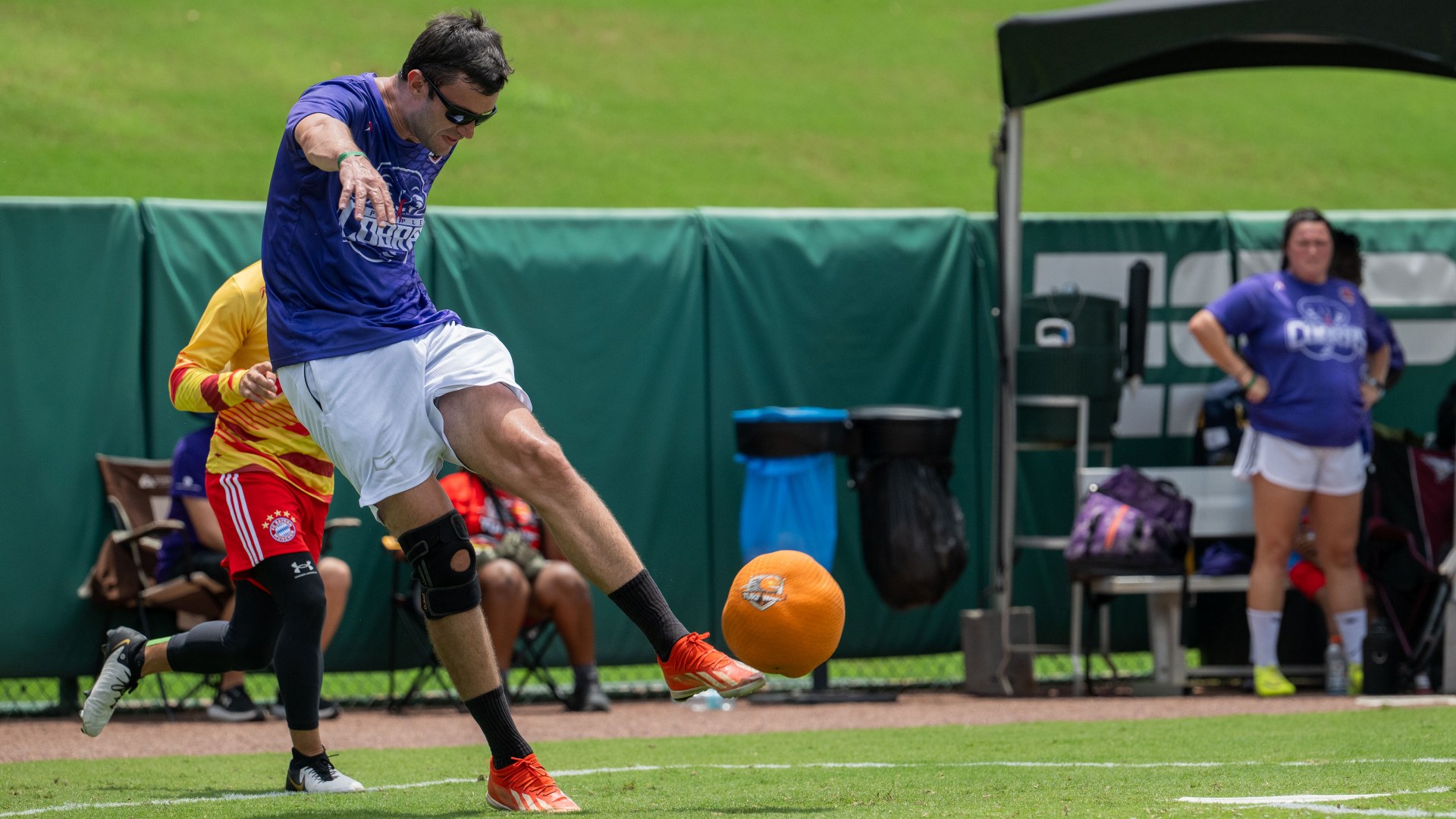 A player kicking during adult kickball at ESPN Wide World of Sports Complex