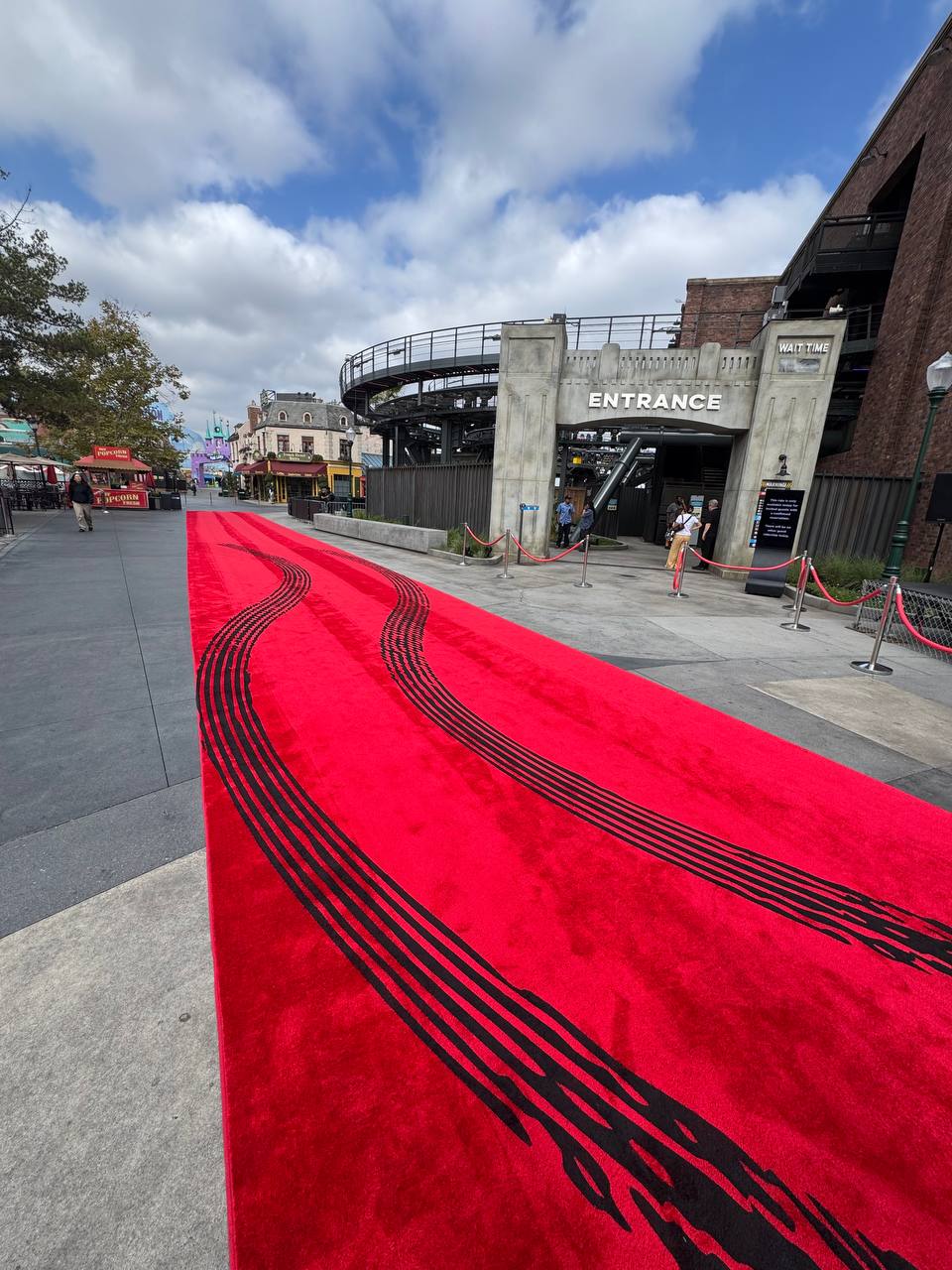 Drift-mark graphics cover the red carpet at today's media event.