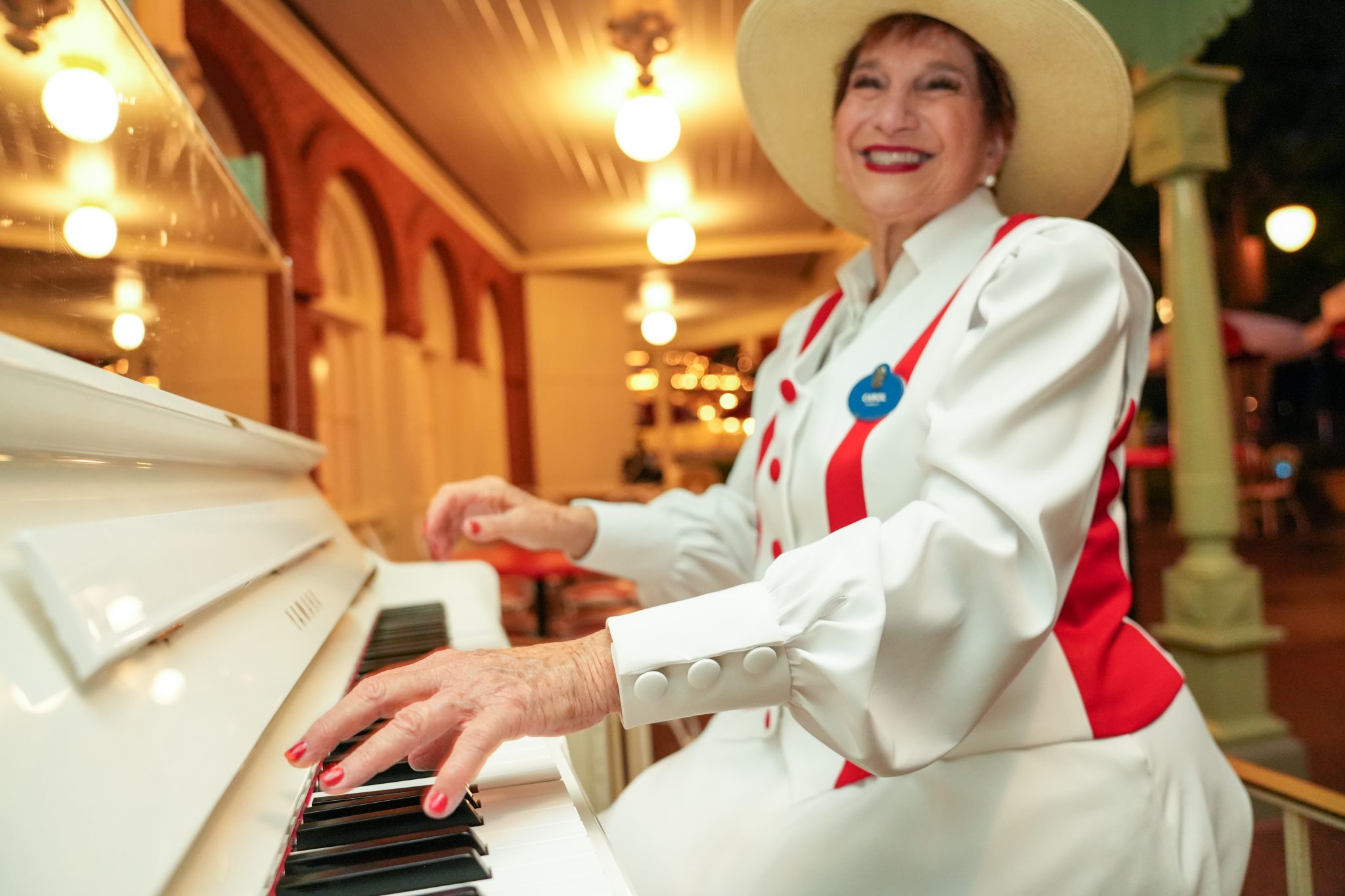Official source photo for Casey's Corner Pianist Carol Debuts at Magic Kingdom
