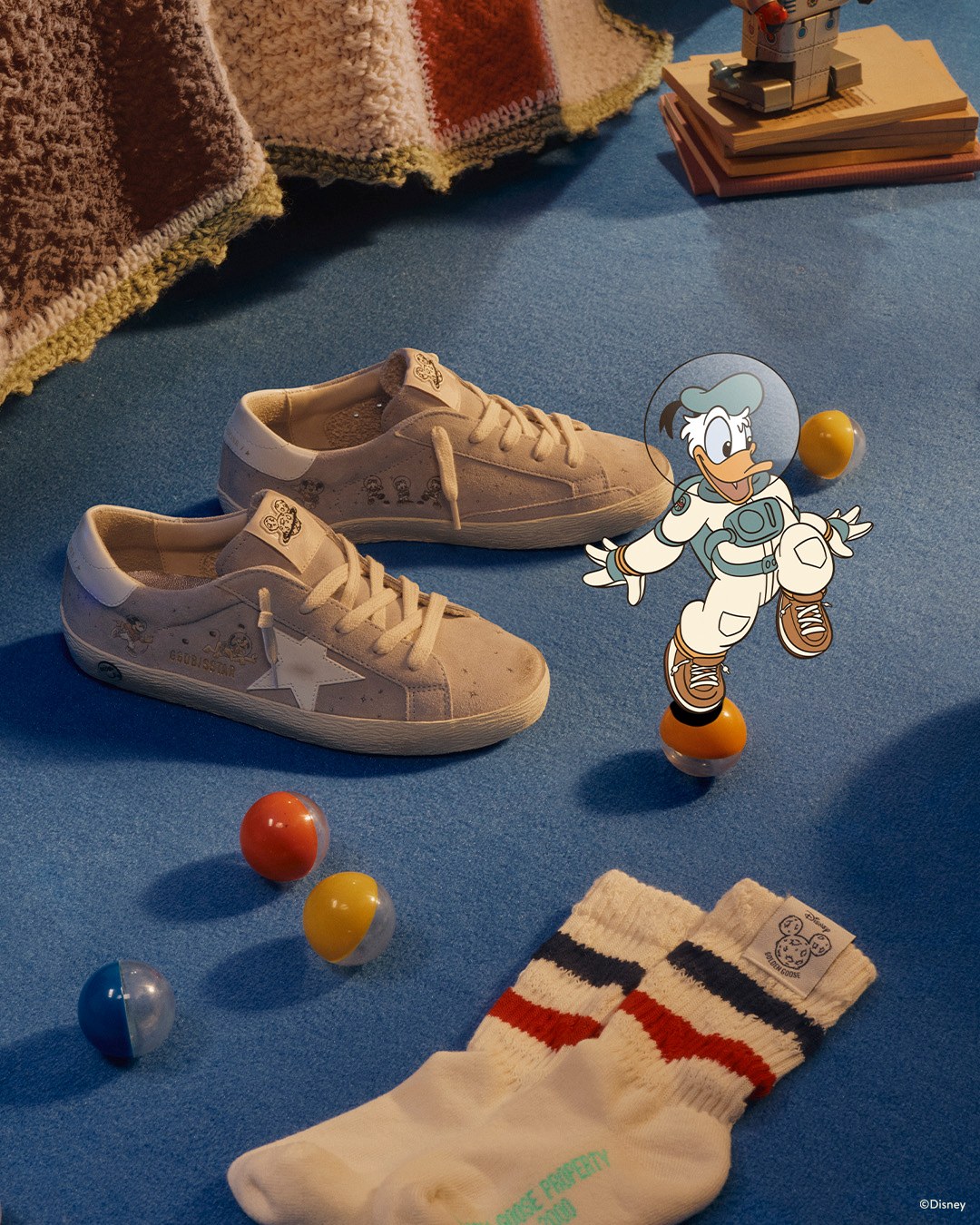Official source photo for Disney Golden Goose Collection Debuts Space-Themed Sneakers